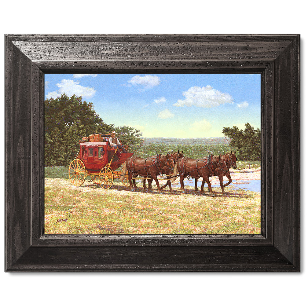 canvas print in a black wood frame depicting a country landscape
with a stagecoach traveling along a dirt road