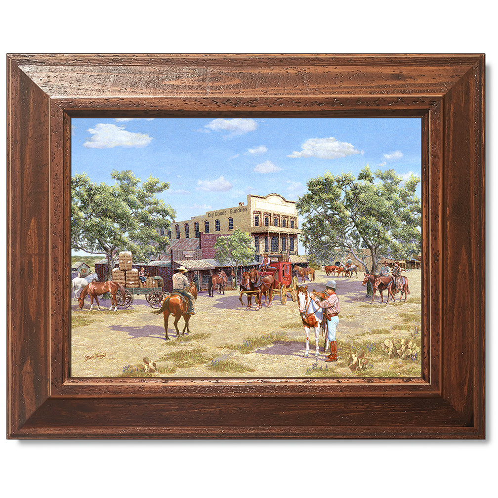 canvas print in a brown wood frame depicting a 1800’s western
town scene with cowboys on horseback