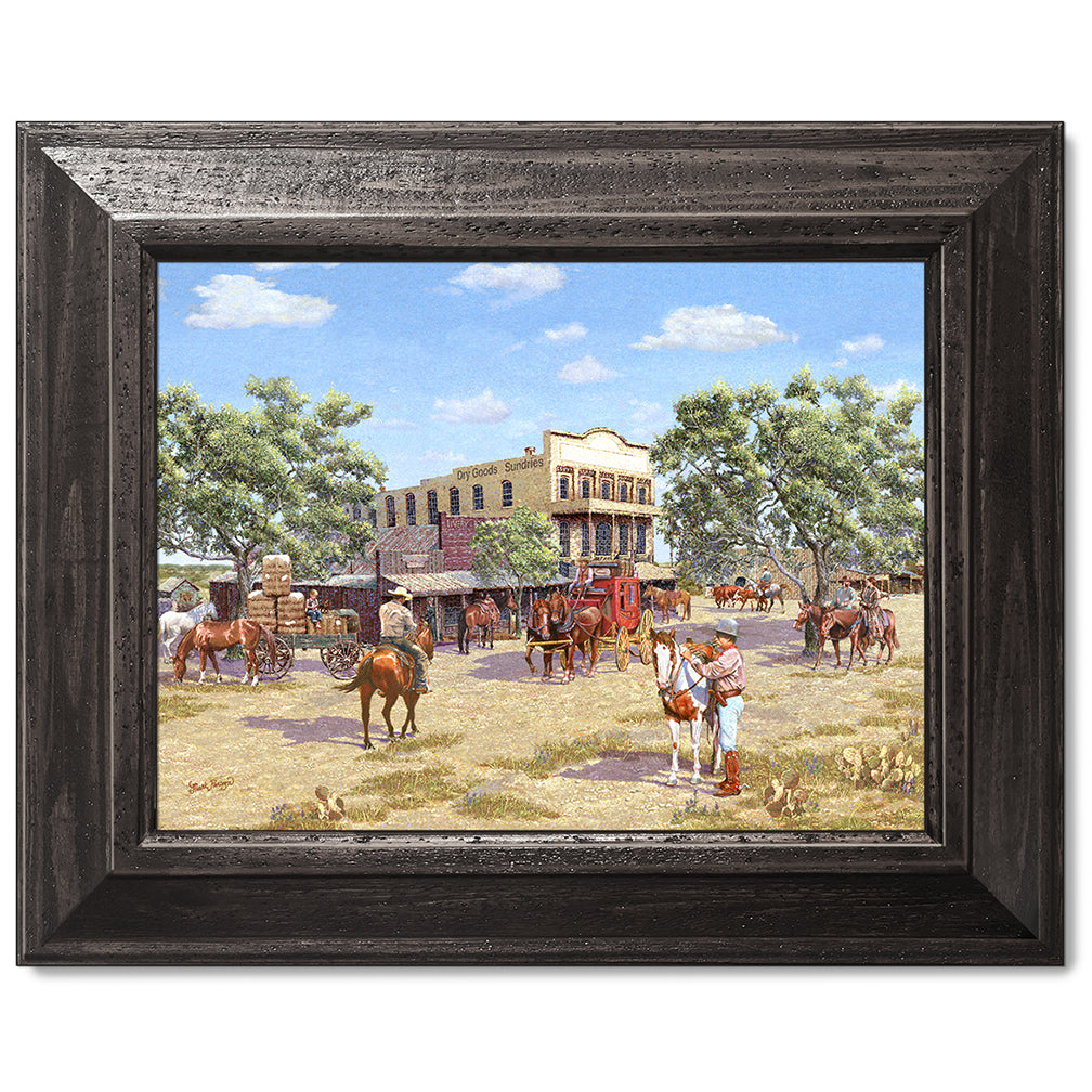 canvas print in a black wood frame depicting a 1800’s western
town scene with cowboys on horseback