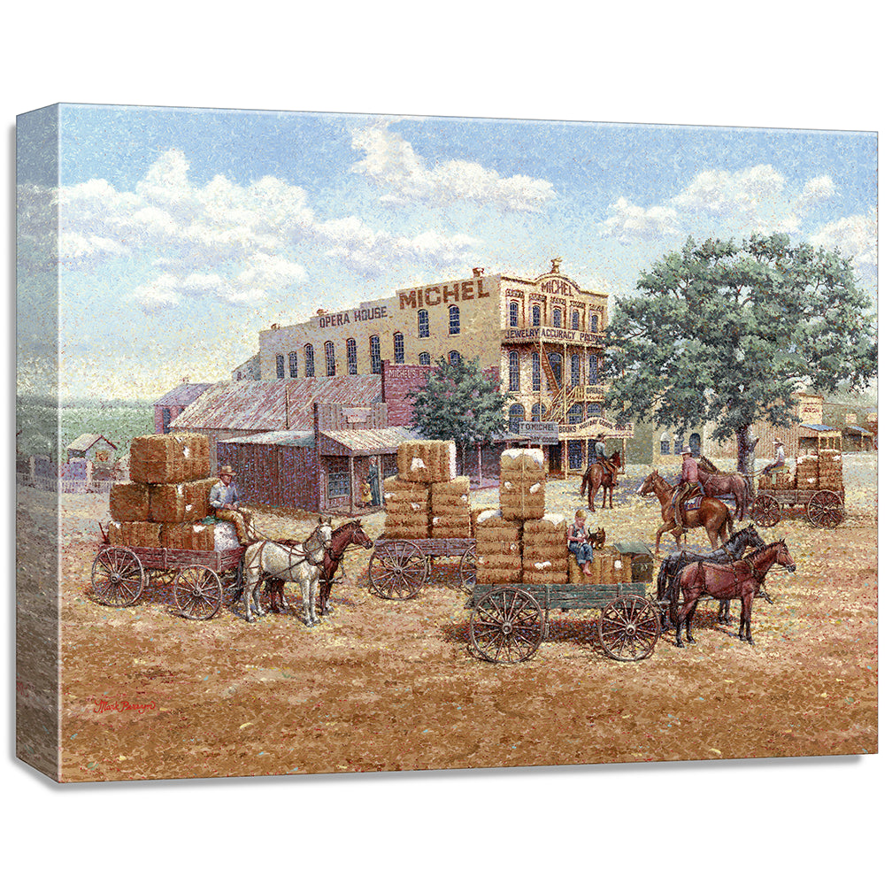 gallery wrapped print on canvas
depicting a main street in a 
western town with cotton wagons hauling large cotton bails