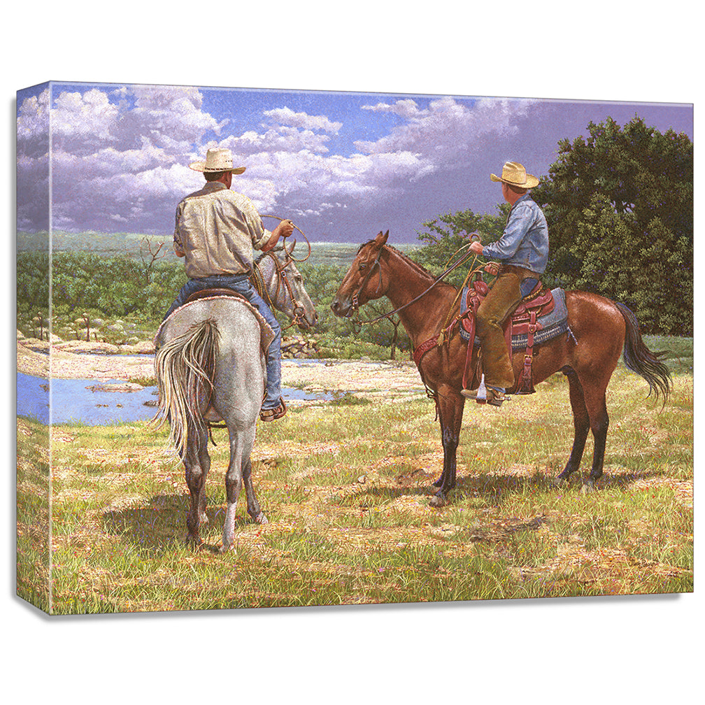 gallery wrapped print on canvas
depicting a country landscape
with two cowboys on horseback watching a thunderstorm