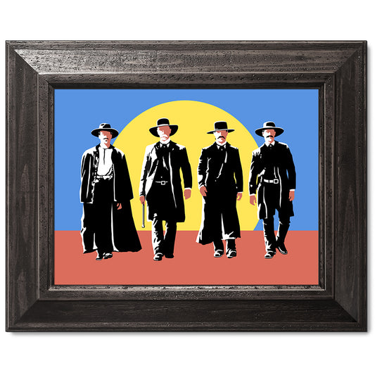 canvas print in a black wood frame depicting four cowboys
wearing black slickers walking side by side toward a showdown