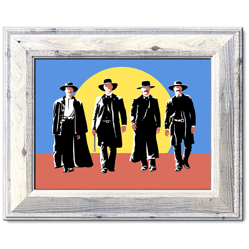 canvas print in a white wood frame depicting four cowboys
wearing black slickers walking side by side toward a showdown