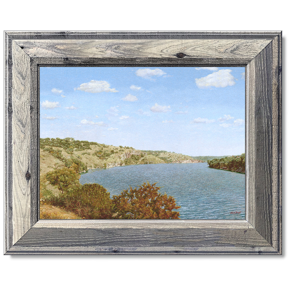 canvas print in a grey wood frame depicting one of the highland
lakes set in a country landscape under blue skies