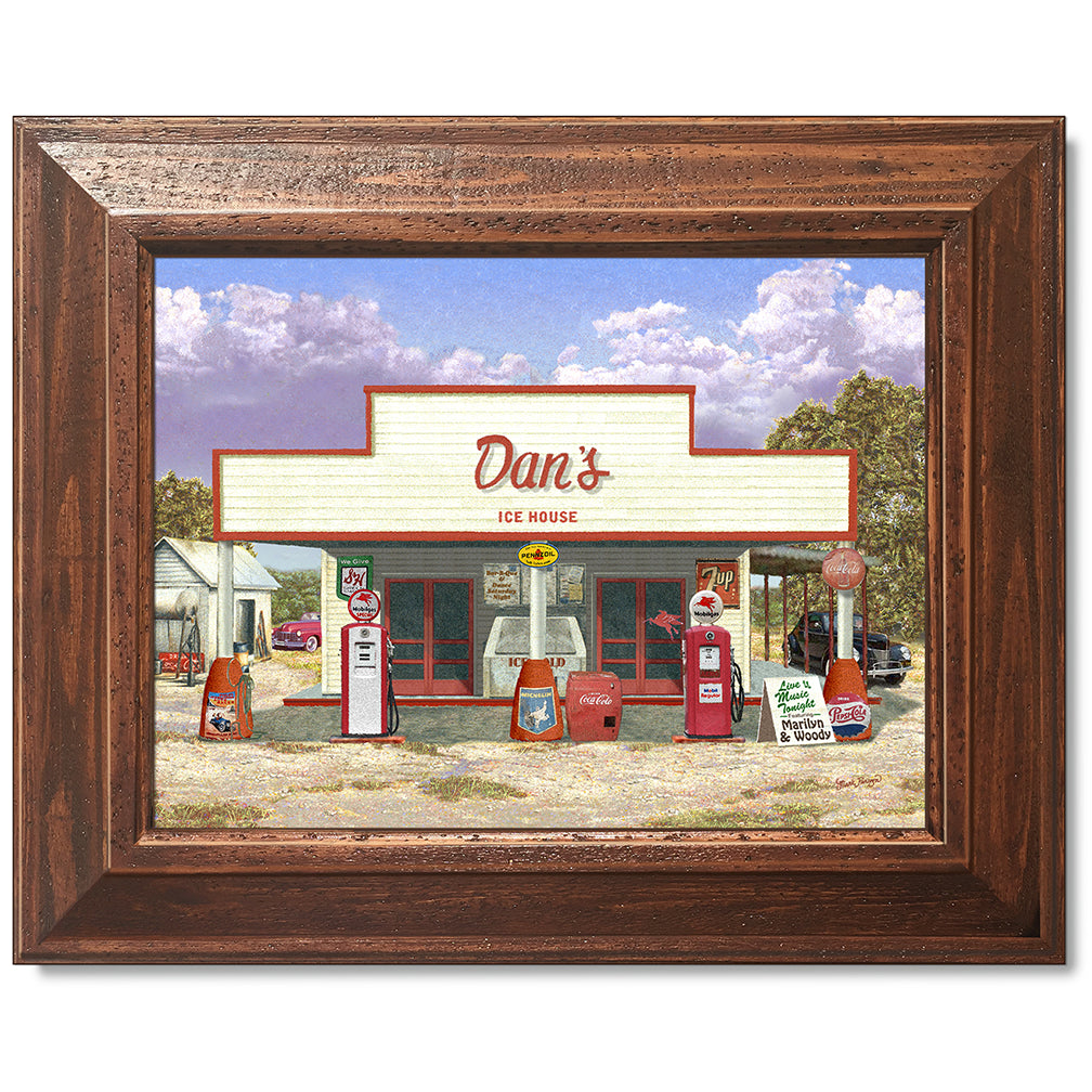 canvas print in a brown wood frame depicting a vintage ice house
with classic cars parked nearby