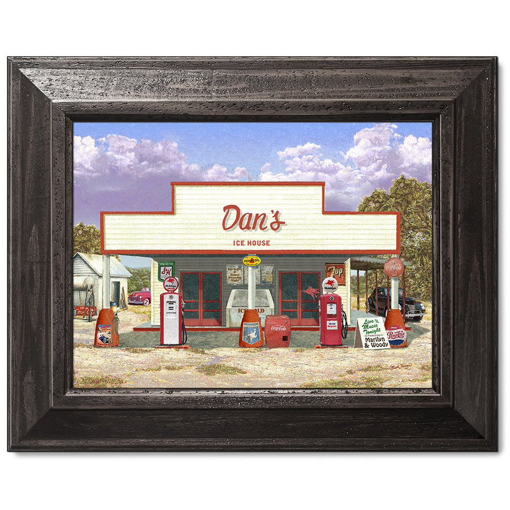 canvas print in a black wood frame depicting a vintage ice house
with classic cars parked nearby