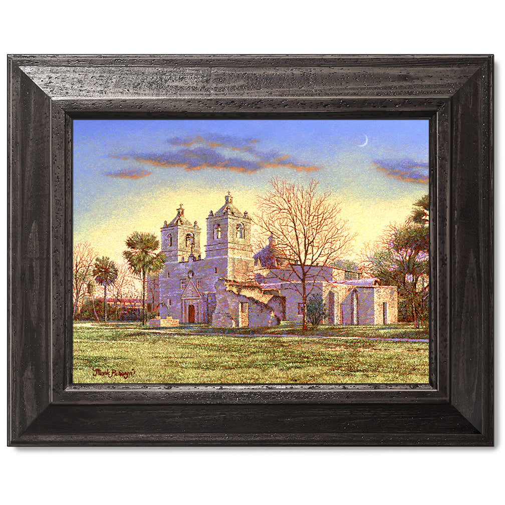 canvas print in a black wood frame depicting a country landscape
with mission concepcion and a waning moon overhead