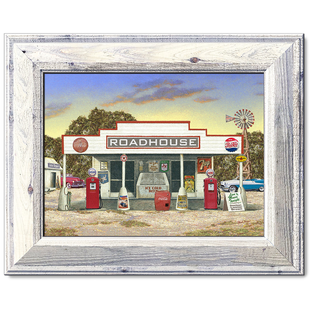 canvas print in a white wood frame depicting a rustic roadhouse
with classic cars parked nearby