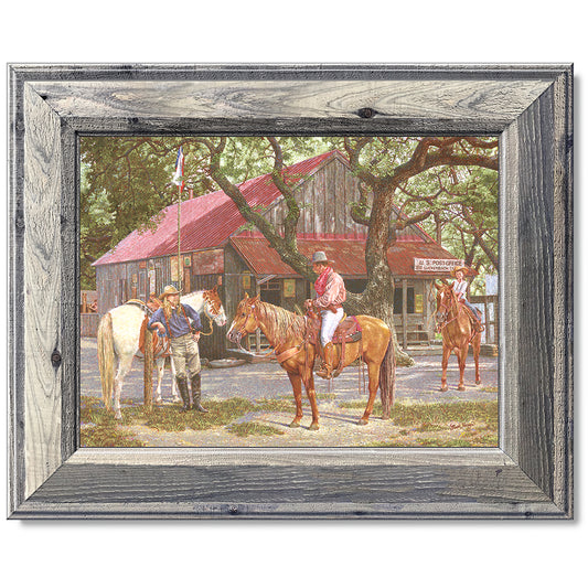 canvas print in a grey wood frame depicting a texas ranger on 
horseback in front of the luckenbach, texas post office 